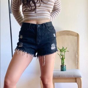 black distressed shorts